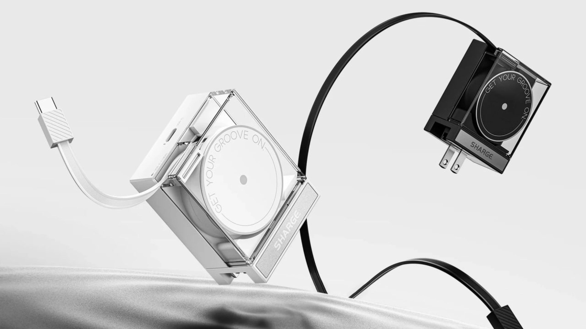 Sharge выпустила Retractable 65 — прозрачную зарядку-рулетку со встроенным USB-кабелем
